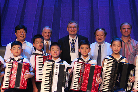 Raymond Bodell, Harley Jones, Li Cong and Pavel Fenuik wtih the young accordionists